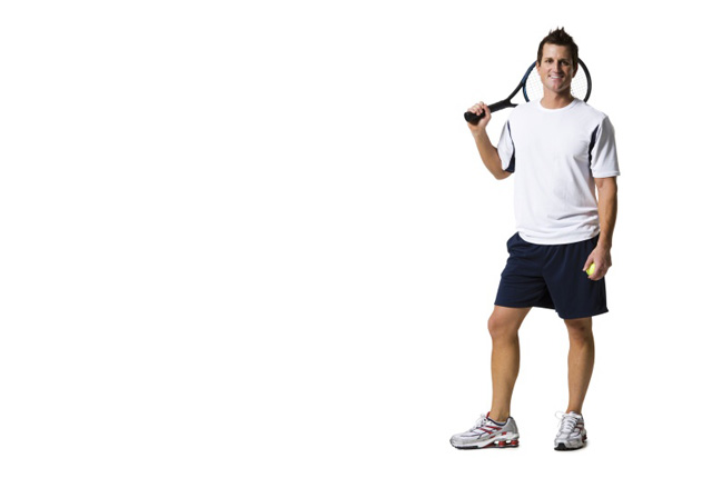 Young man with tennis racket