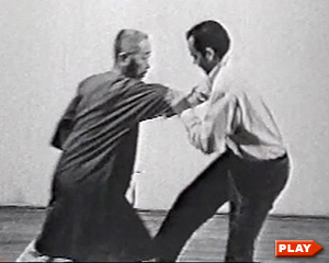 Cheng Man Ching pushing hands with Tam Gibbs, a senior student