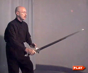 Ken Van Sickle showing Still Point exercise with the Tai Chi sword