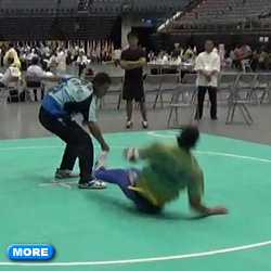 Tuishou Chen pushing opponent to the ground in moving step competition