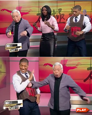 William Chen demonstrates jab and back fist to TV commentators